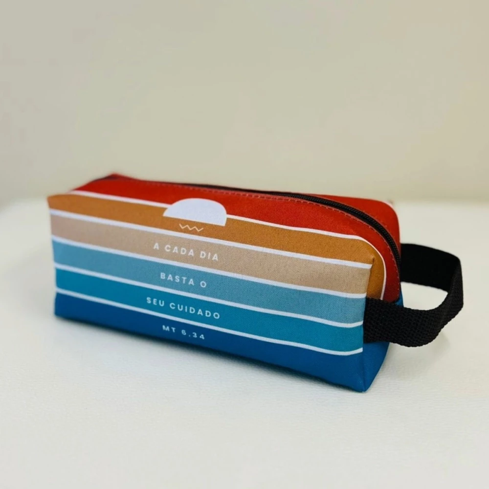 imagem de Necessaire - A Cada Dia Basta o Seu Cuidado